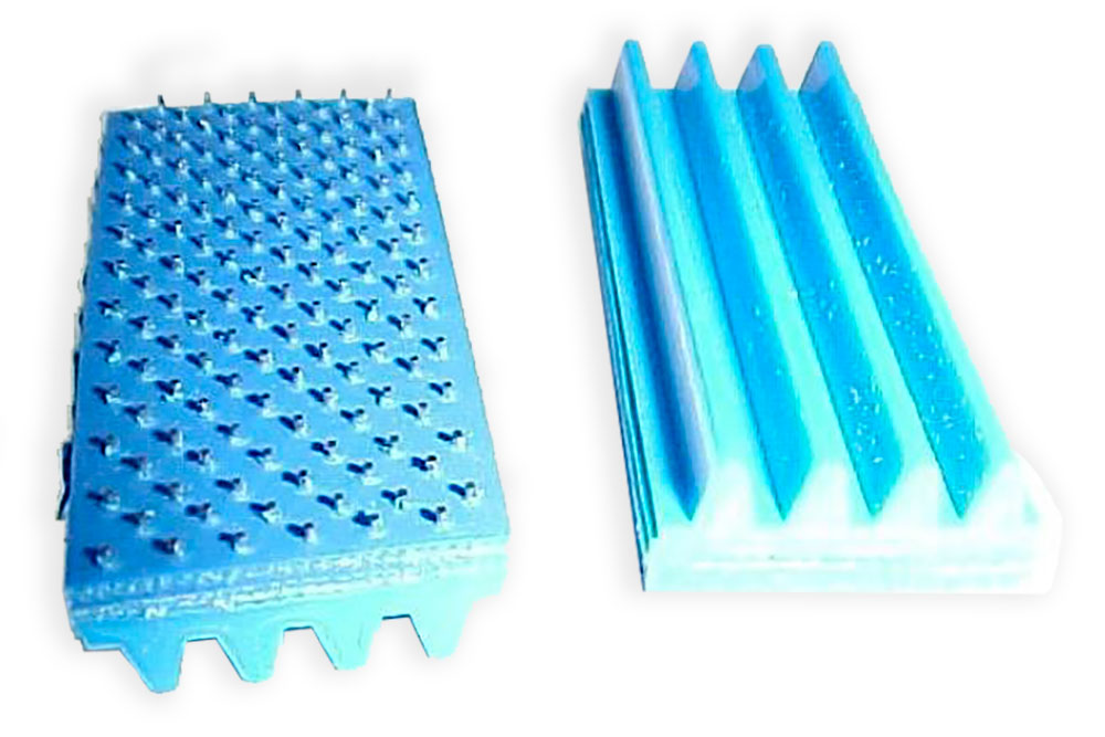 Front and back of Spike Belts
